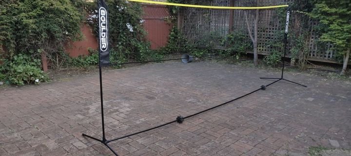 Before: Old, worn brick patio